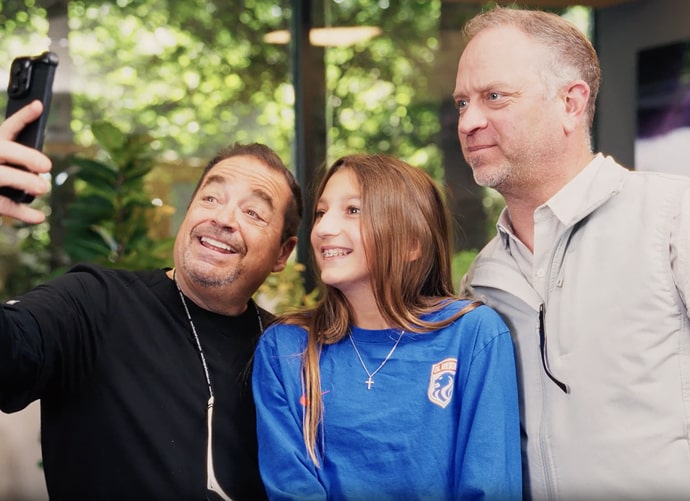 Dr Sherman is shaking hands with his happy patient