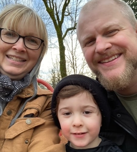 Joyce is smiling with a family