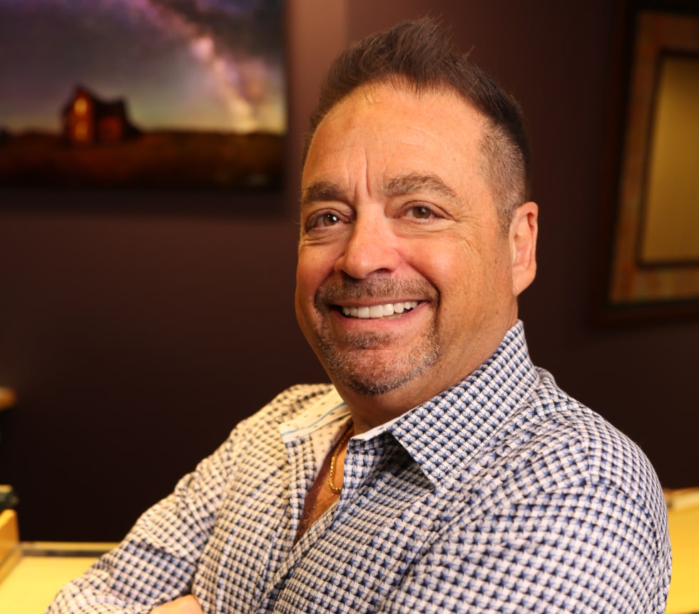 Dr. Ron Sherman is warmly smiling